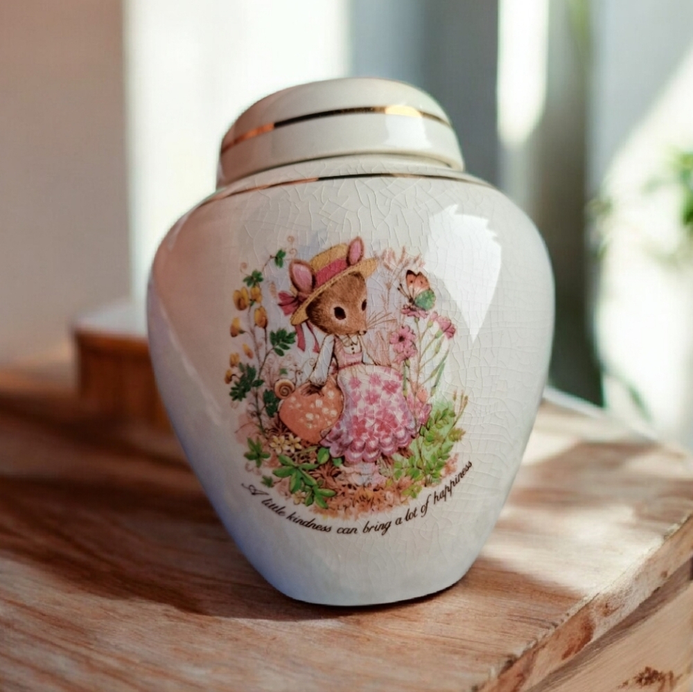 Charming White Ceramic Jar with Gold Accents